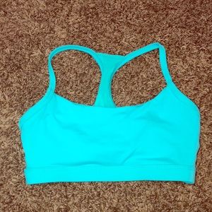 Teal Fabletics sports bra